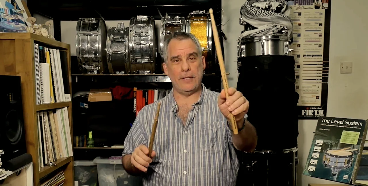 Joe Ospalla demonstrating drum stick hold